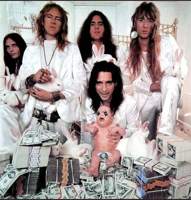 Alice Cooper and a baby with panda eyes