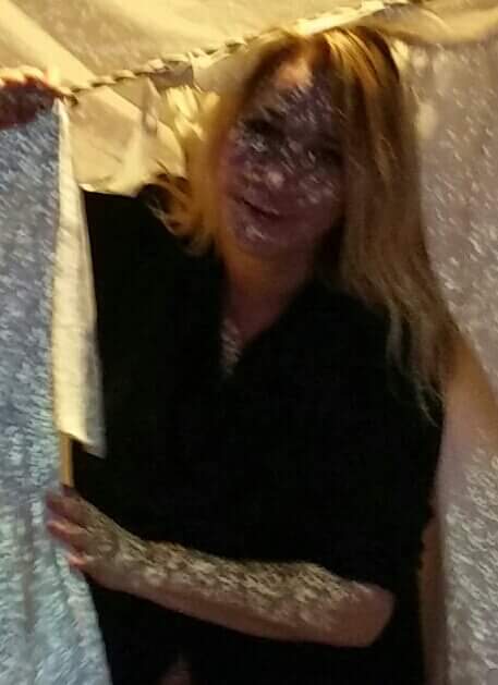 Woman looking like a reptilian alien